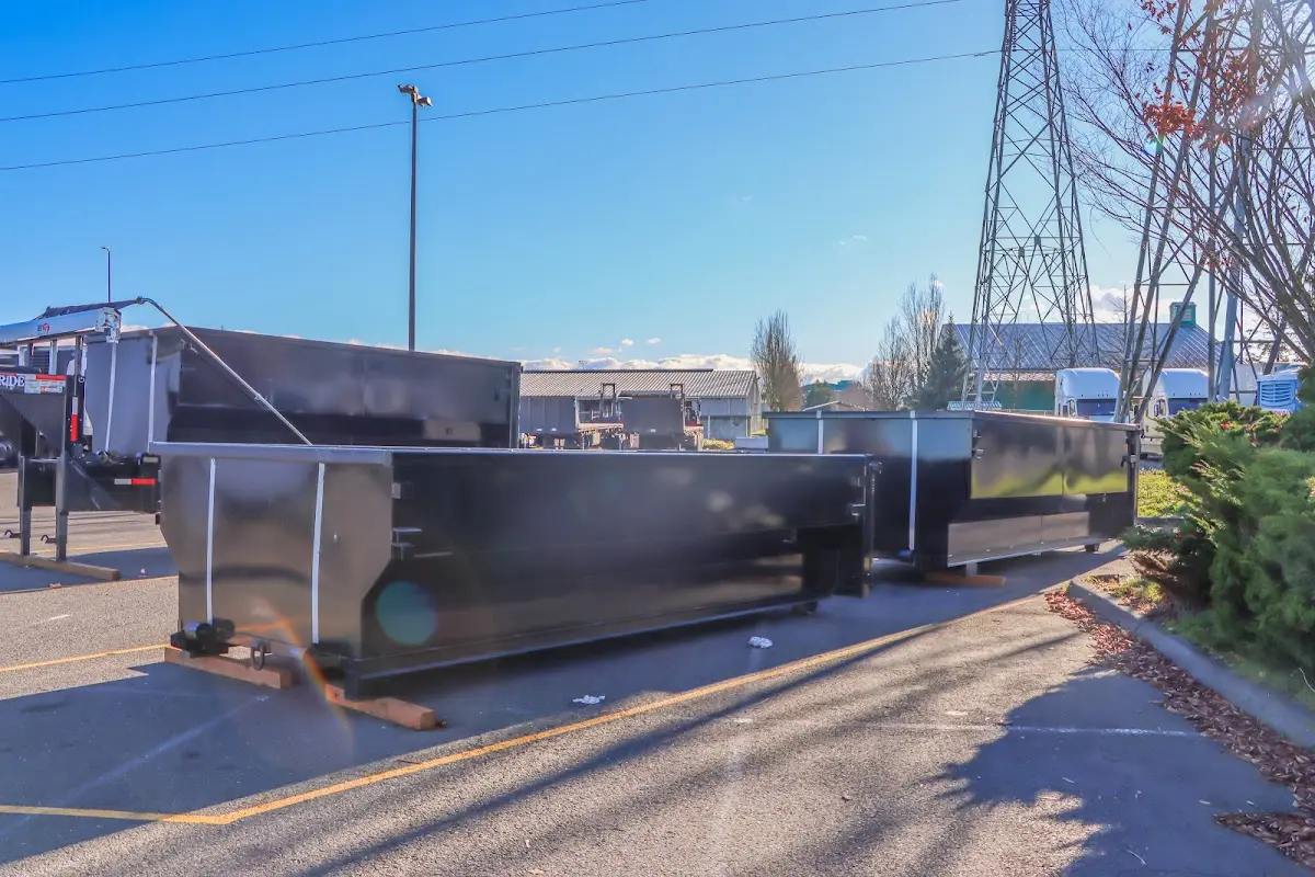 Roll-off dumpster ready for waste disposal at job site for 3 Yard Dumpster Rental in Canton